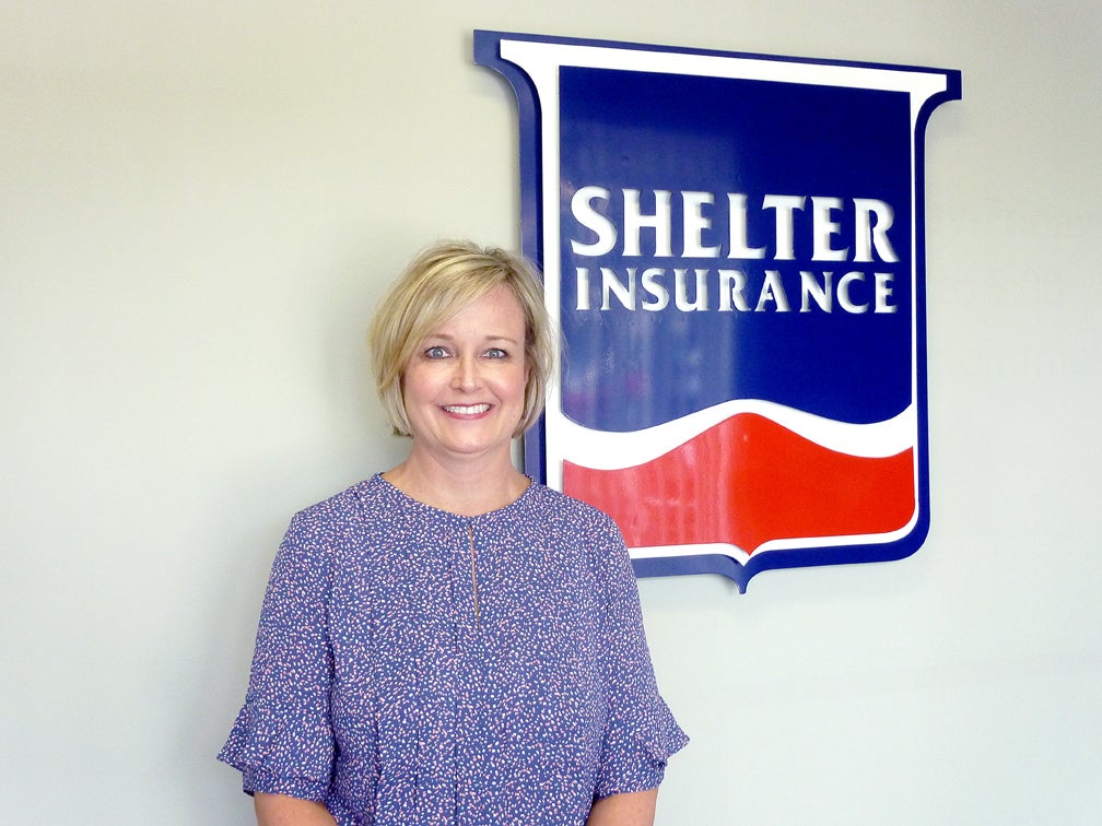 At your service: Shelter Insurance agent Audrey Marshall serving customers 24 hours a day, seven days a week, 365 days a year