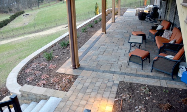 Create an inviting entrance with pavers, brick and stone