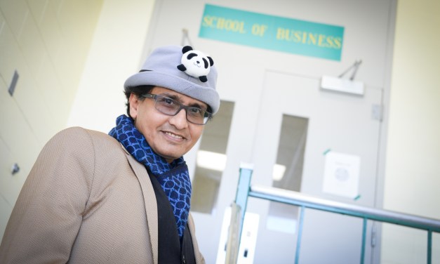 Creating balance: Banerjee harmonizes economics with music